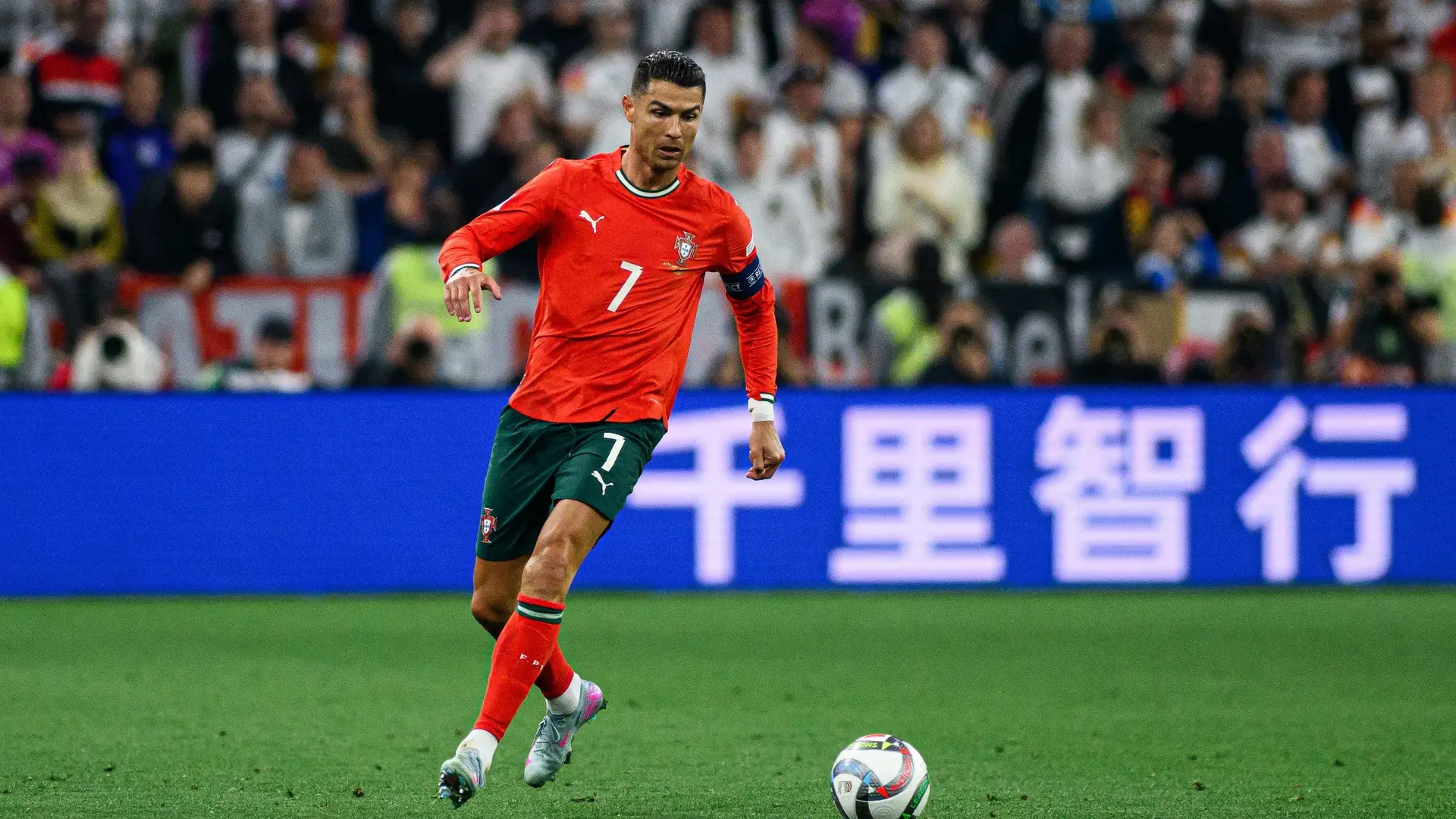Colombia vs Portugal at the 2026 World Cup with Cristiano Ronaldo challenging for the ball