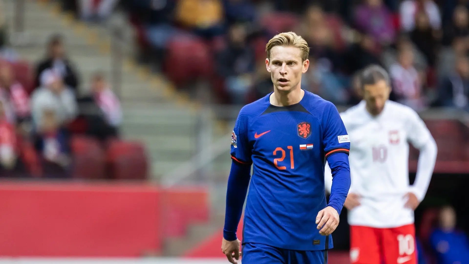 Netherlands and Tunisia players competing during a World Cup match.