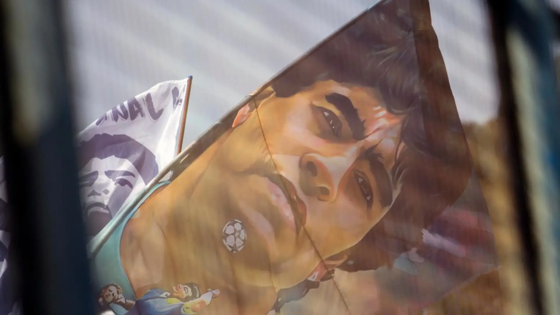 A supporters’ flag depicts Diego Maradona ahead of Argentina’s World Cup semifinal against England