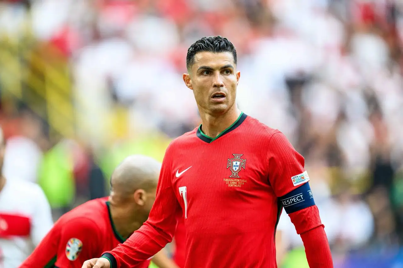 Cristiano Ronaldo wearing Portugal red during a match.