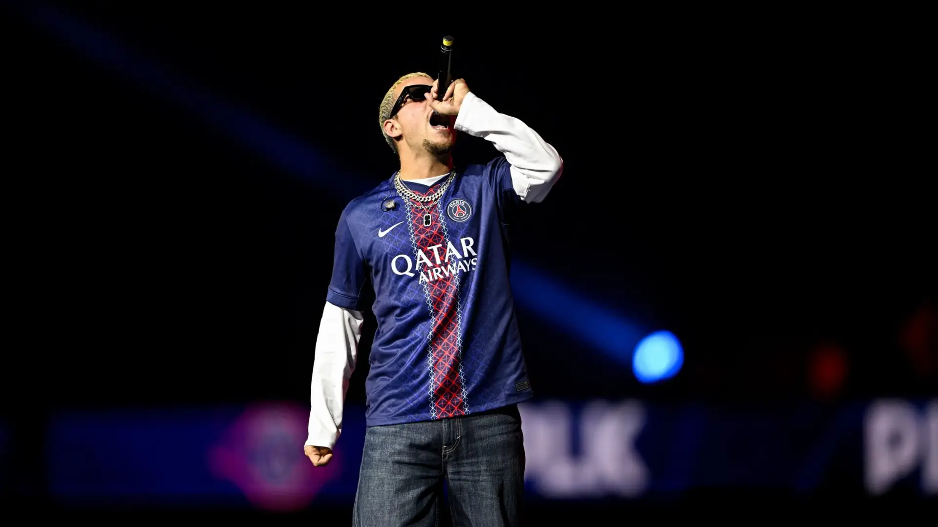 SDM performs in a Paris Saint-Germain shirt during a PSG celebration
