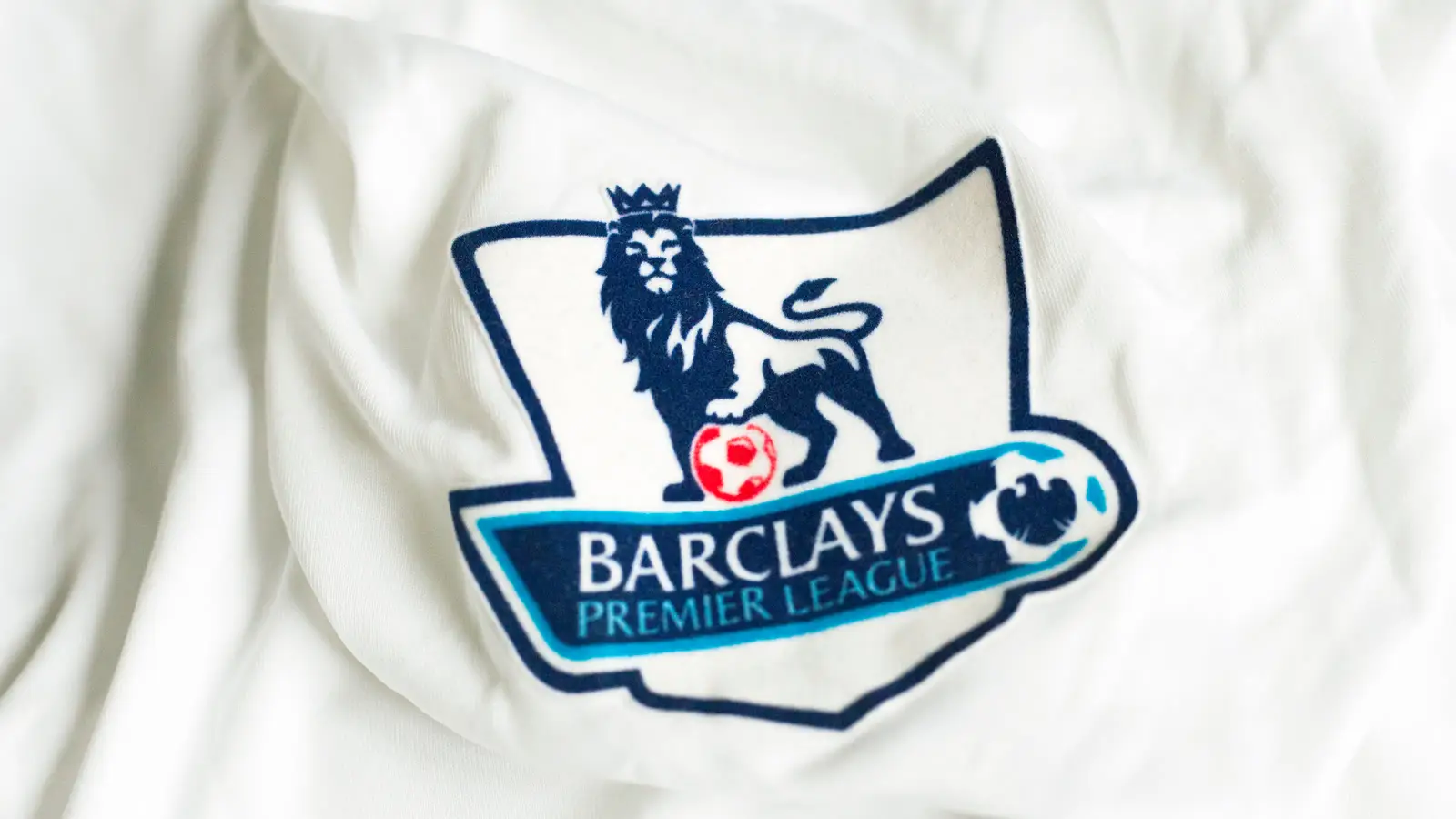 Barclays Premier League lion badge on a white football shirt