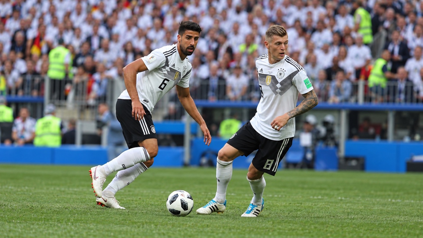 Sami Khedira and Toni Kroos wearing Germany’s white 2018 home kit during the World Cup.