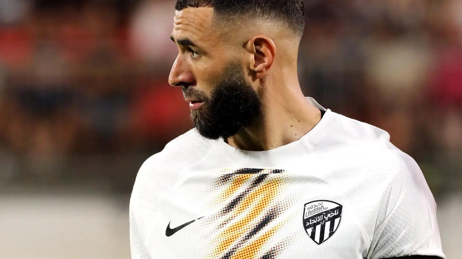 Karim Benzema wearing an Al-Ittihad shirt