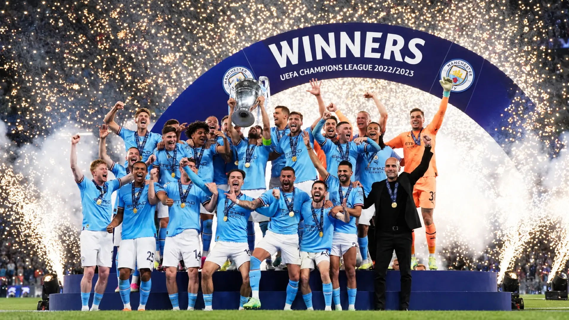 Manchester City players and Pep Guardiola celebrate with the Champions League trophy after winning the 2023 final in Istanbul.