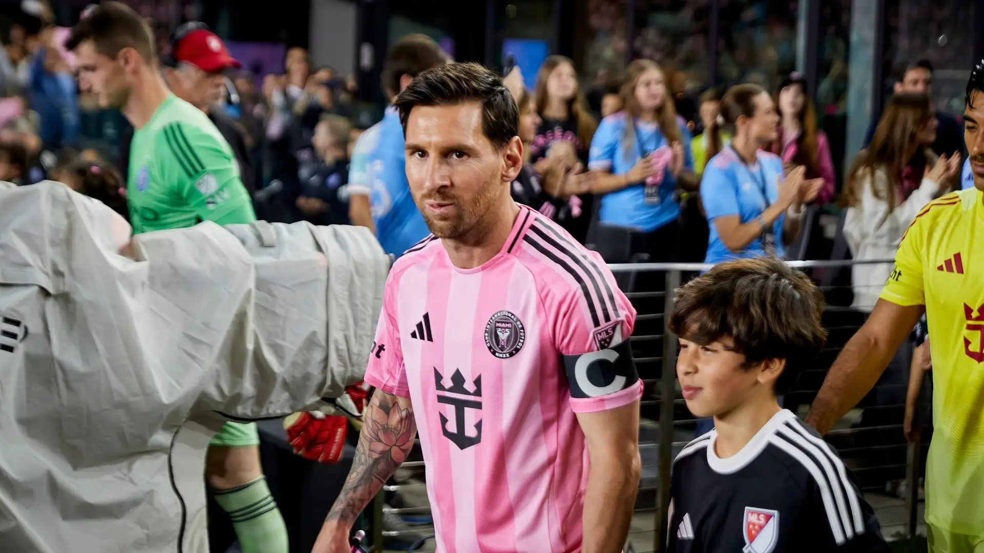 Lionel Messi walks onto the field before an Inter Miami match