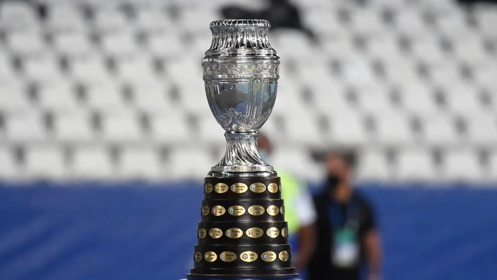Copa América trophy on display in a stadium